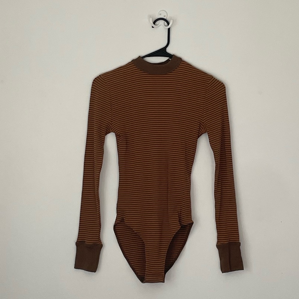 Urban Outfitters body suit. Never worn. Striped. Size S. One piece.